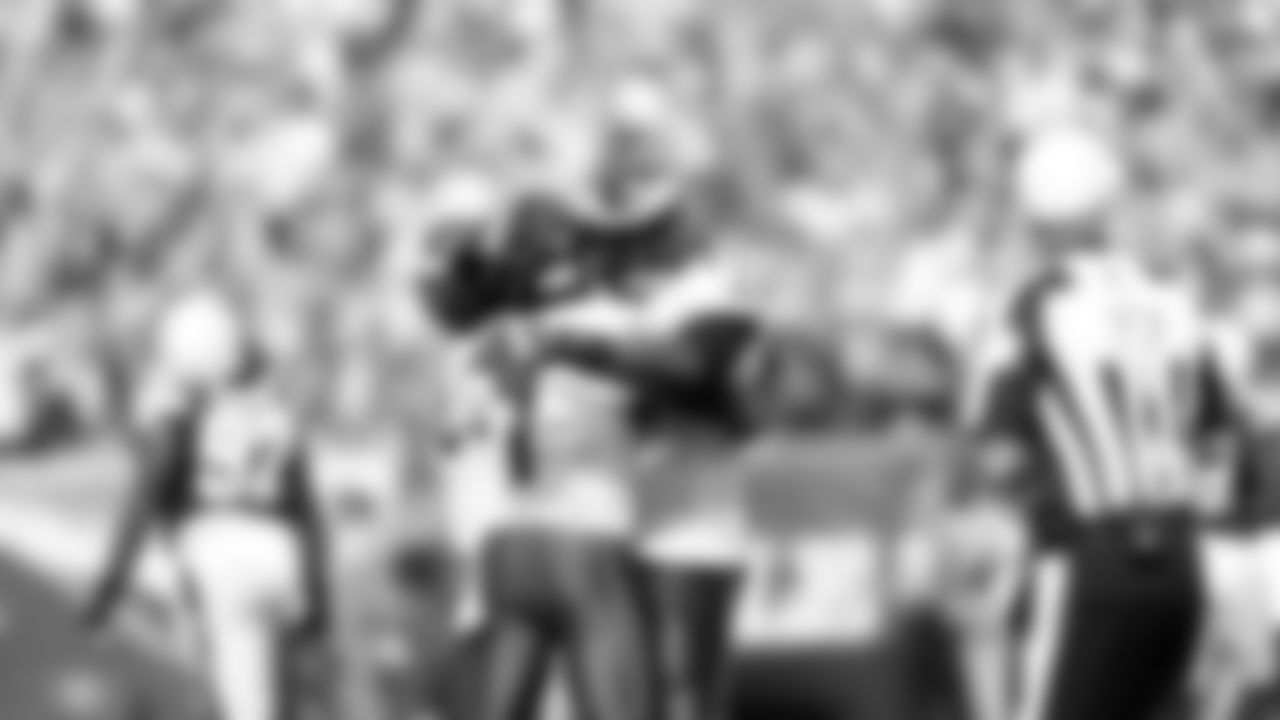 Quarterback Michael Vick and offensive tackle Jason Peters celebrate the Eagles' touchdown in the second half against the Chargers.