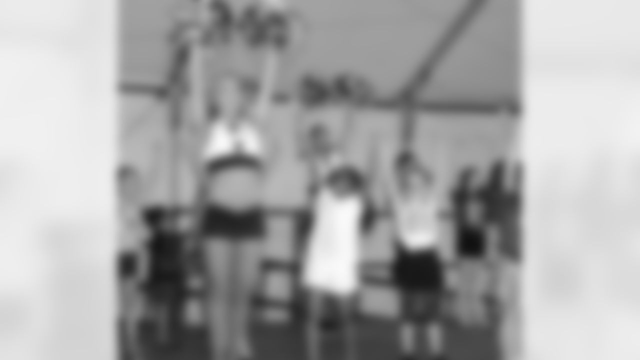 Jillian instructing a Junior Cheer Clinic in HeadHouse Plaza.