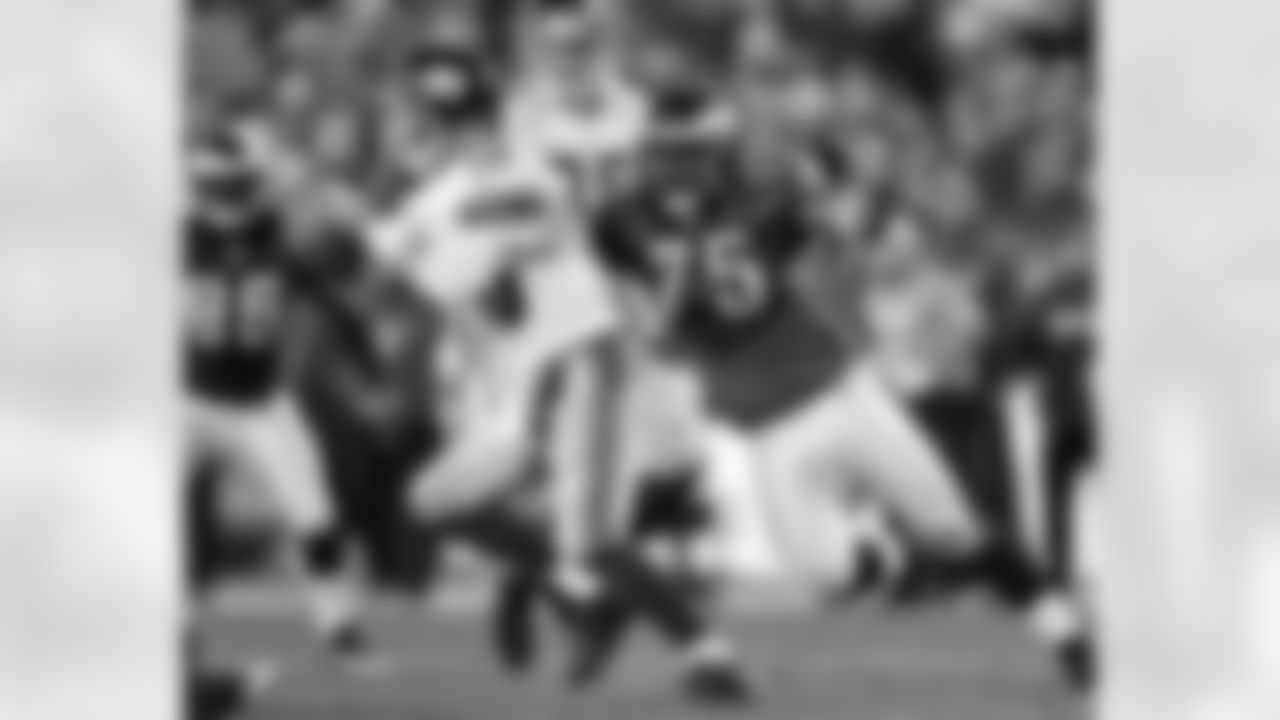 DE Juqua Parker with pressure on Giants QB Eli Manning