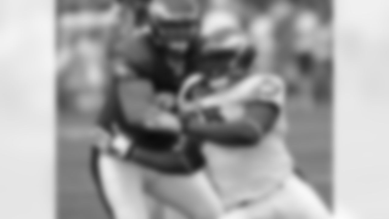 Rookie DE Josh Gaines fights through a block in one-on-one drill