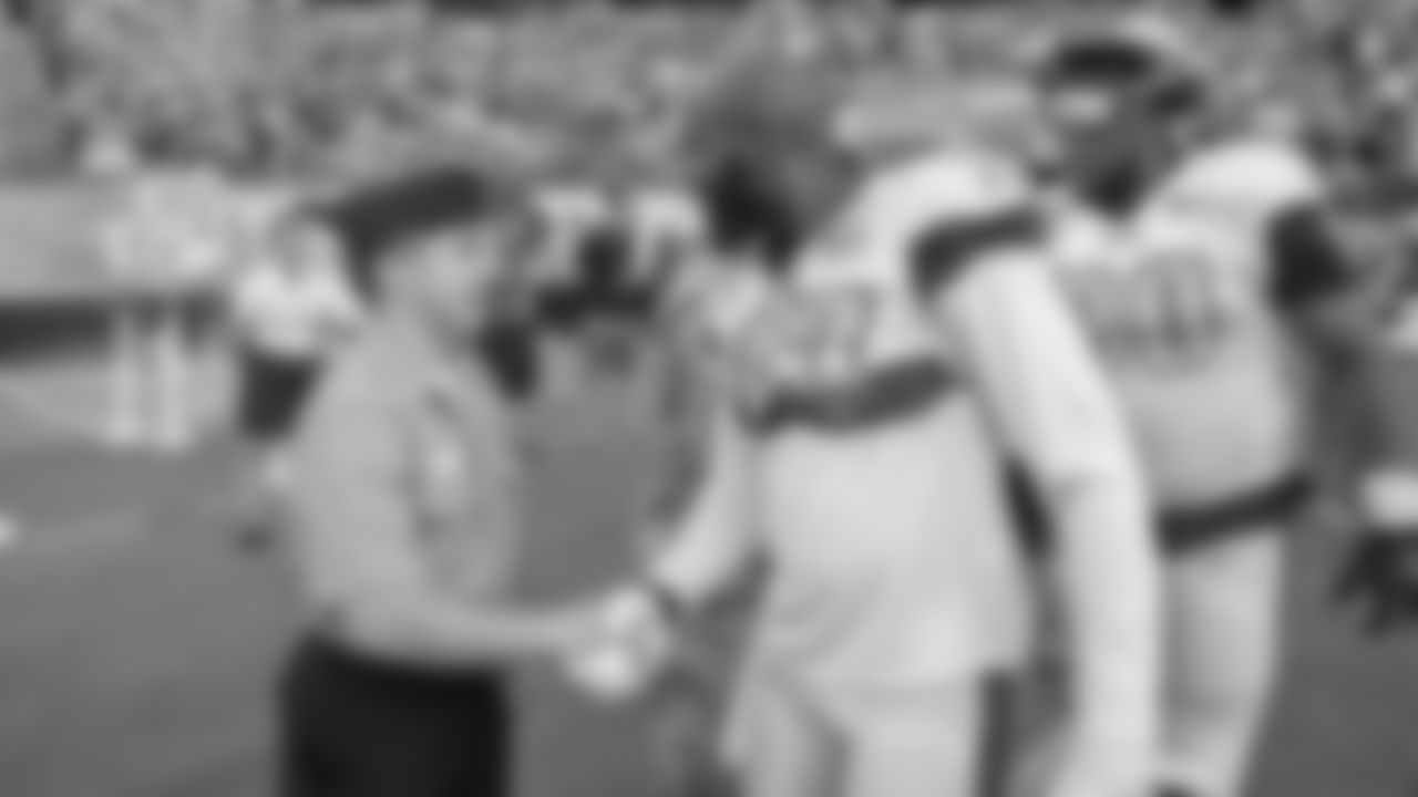 S Malcolm Jenkins greeting a member of the military