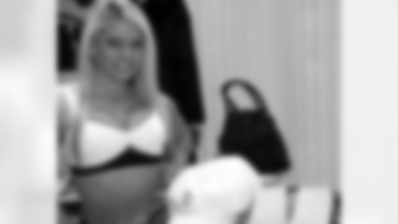 Lauren shows off the Tackling Breast Cancer merchandise