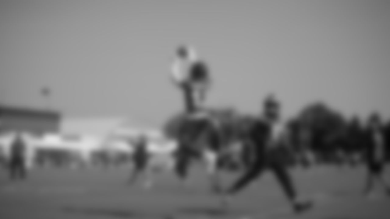 Olamide Zaccheaus leaping for a catch.