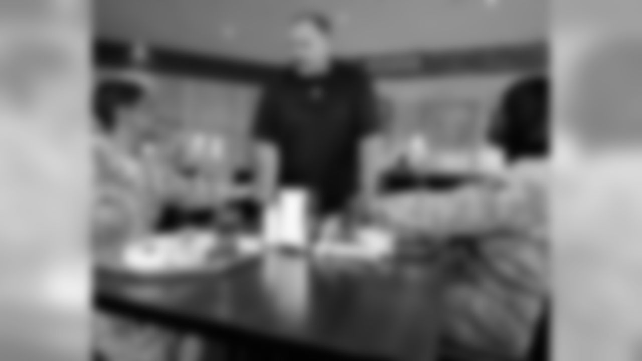 Reid visits with service members at a dining facility at Ramstein Air Base in Germany