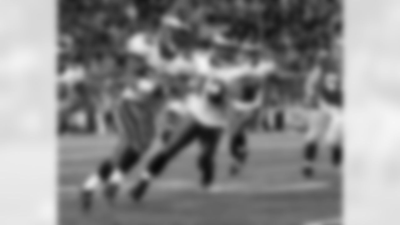 Trent Cole makes the interception and heads for six points