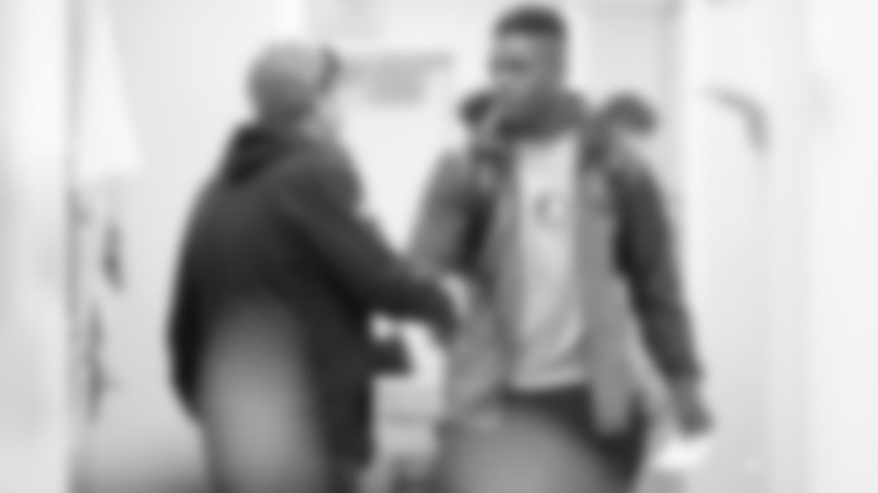 RB Ryan Green meets director of equipment operations Greg Delimitros.