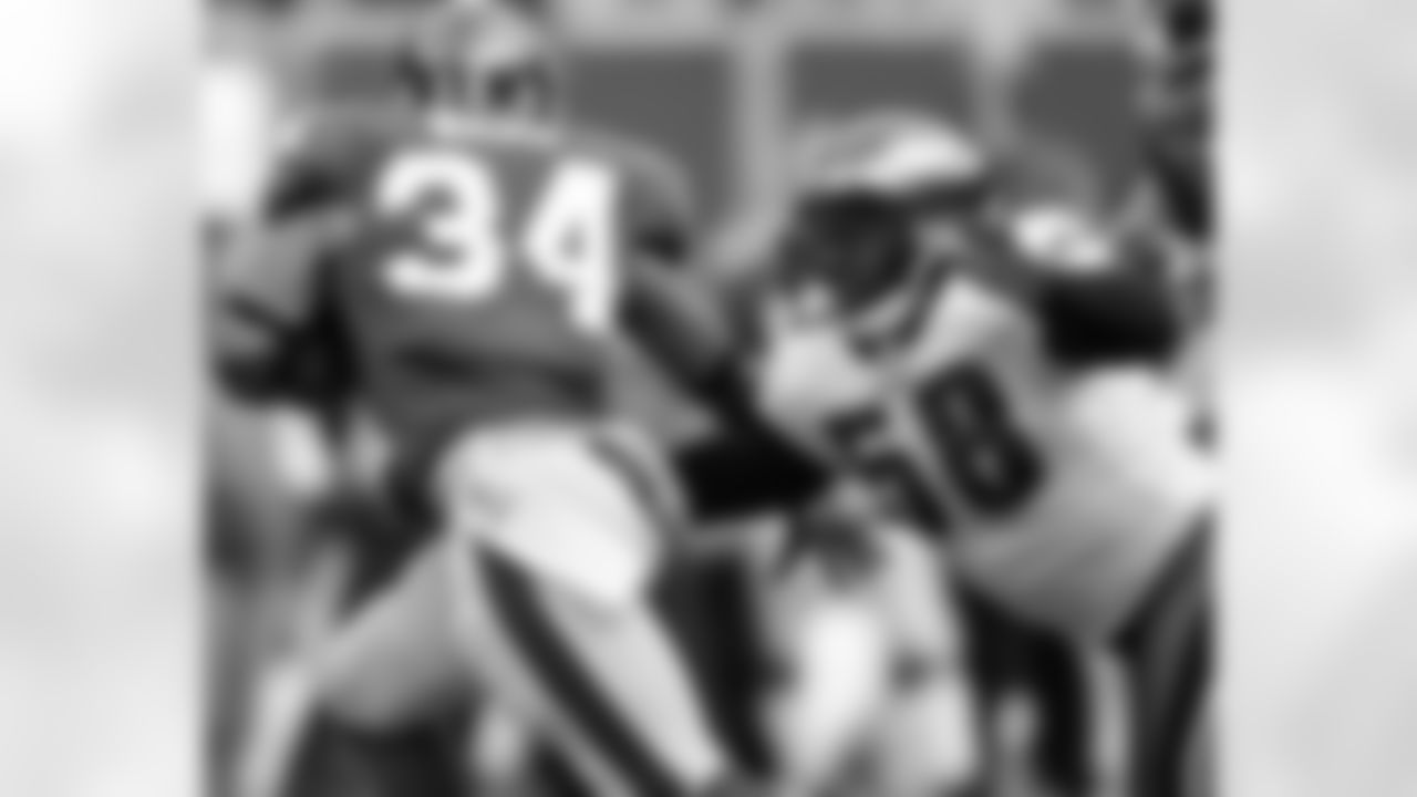 DE Trent Cole goes for the tackle