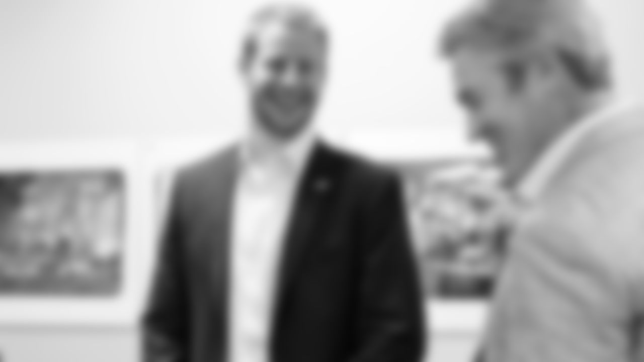 Carson Wentz sharing a laugh with head coach Doug Pederson upon arriving at the NovaCare Complex