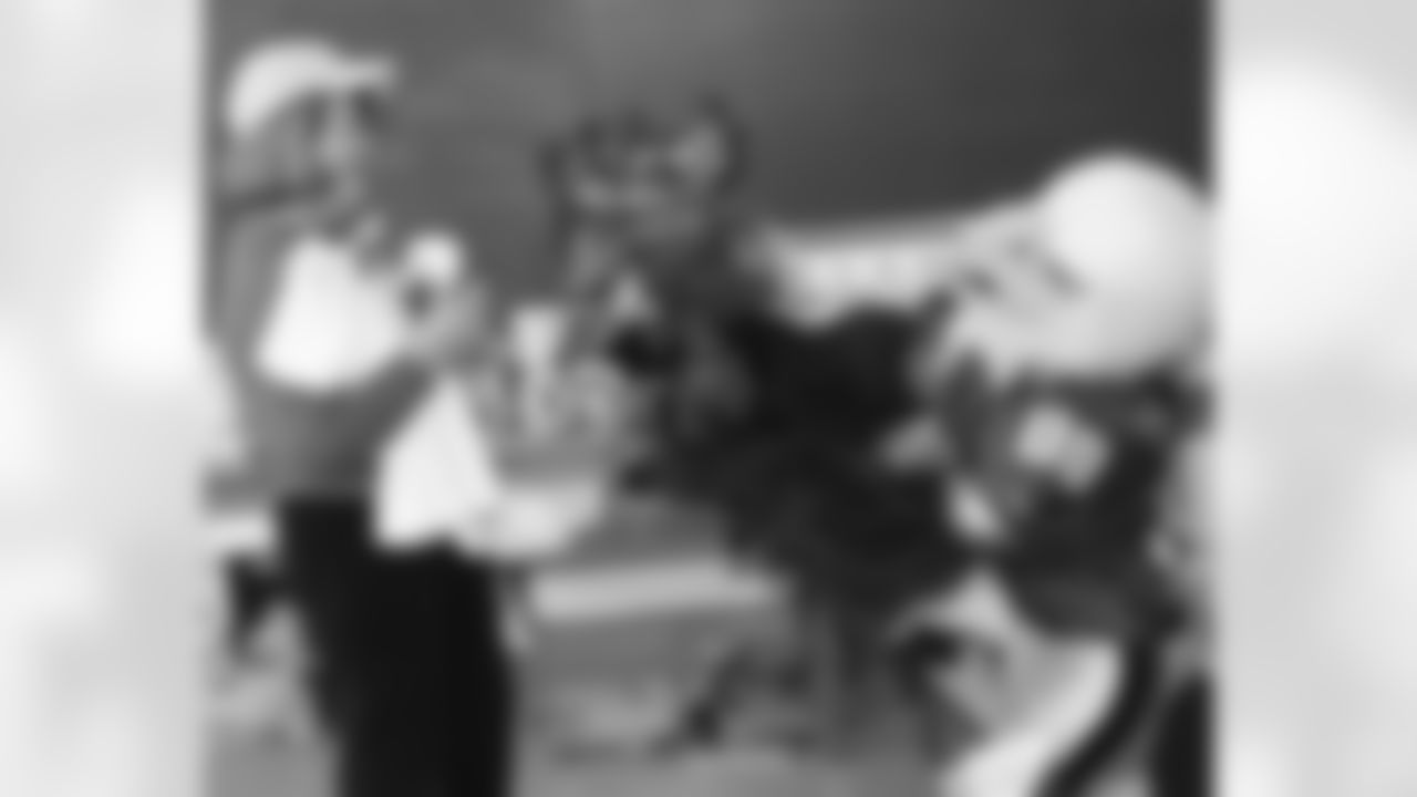 Barbara Light, a teacher at St. Francis Xavier School in Philadelphia, receives a bouquet of roses