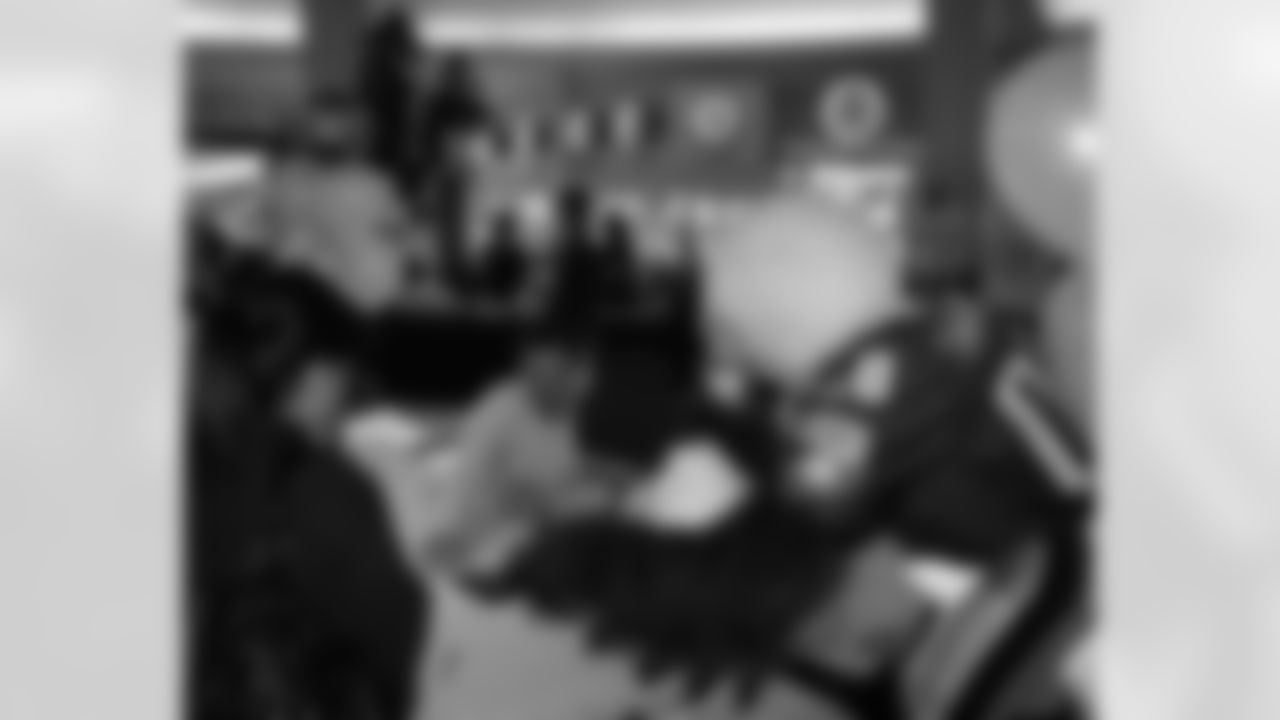 Kevin Curtis gets attacked as SWOOP tries to get in on the autograph action