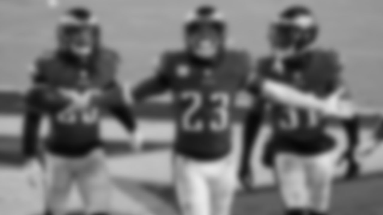 S Rodney McLeod celebrates with CBs Avonte Maddox and Nickell Robey-Coleman