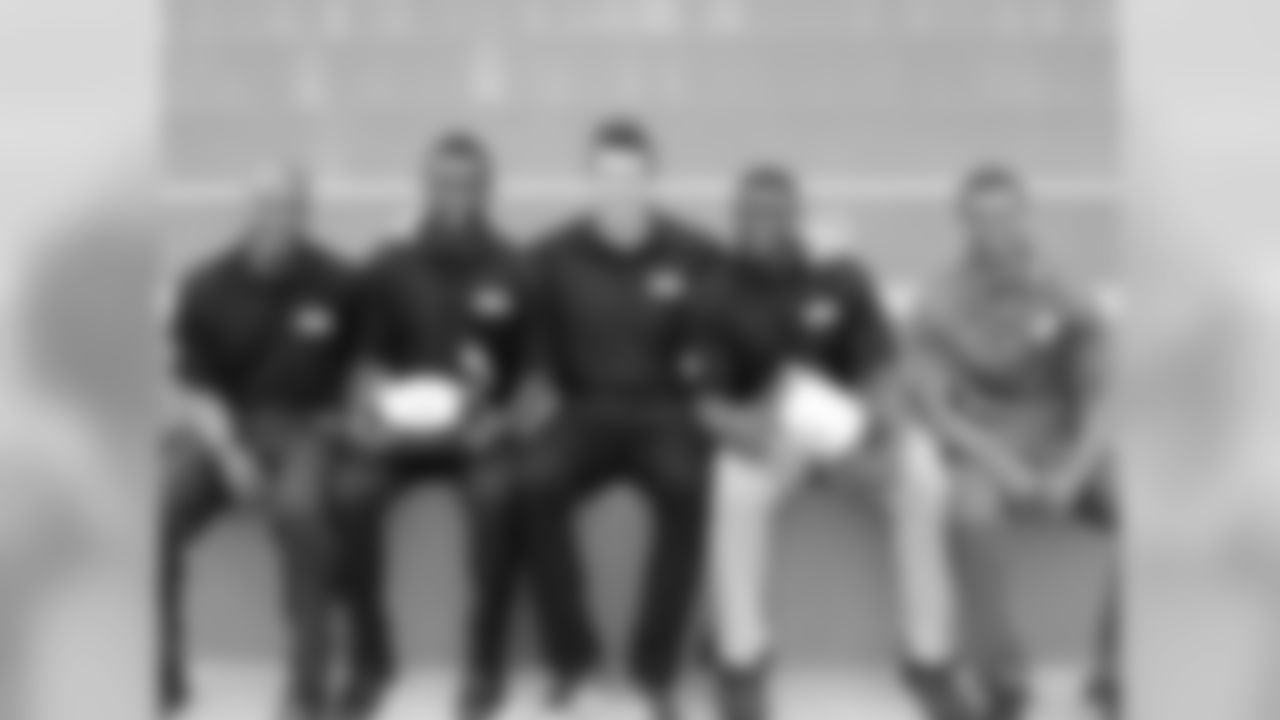 James Harris, Connor Barwin and Matt Harper with students who are part of the Philadelphia Futures program