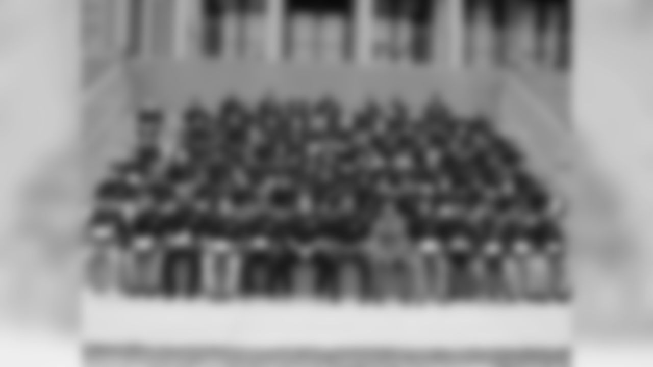 The 2014 Eagles Youth Partnership Top Achievers gathered for a group photo at the NovaCare Complex following the awards ceremony