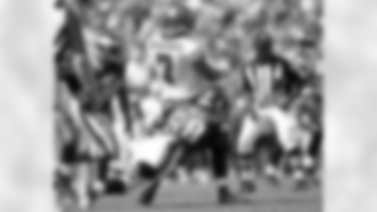 DE Trent Cole wraps up the legs of Bucs QB Bruce Gradkowski, but after the ball was in play downfield