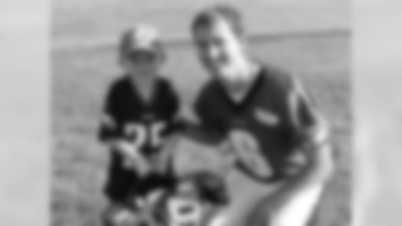 K Alex Henery with a young fan