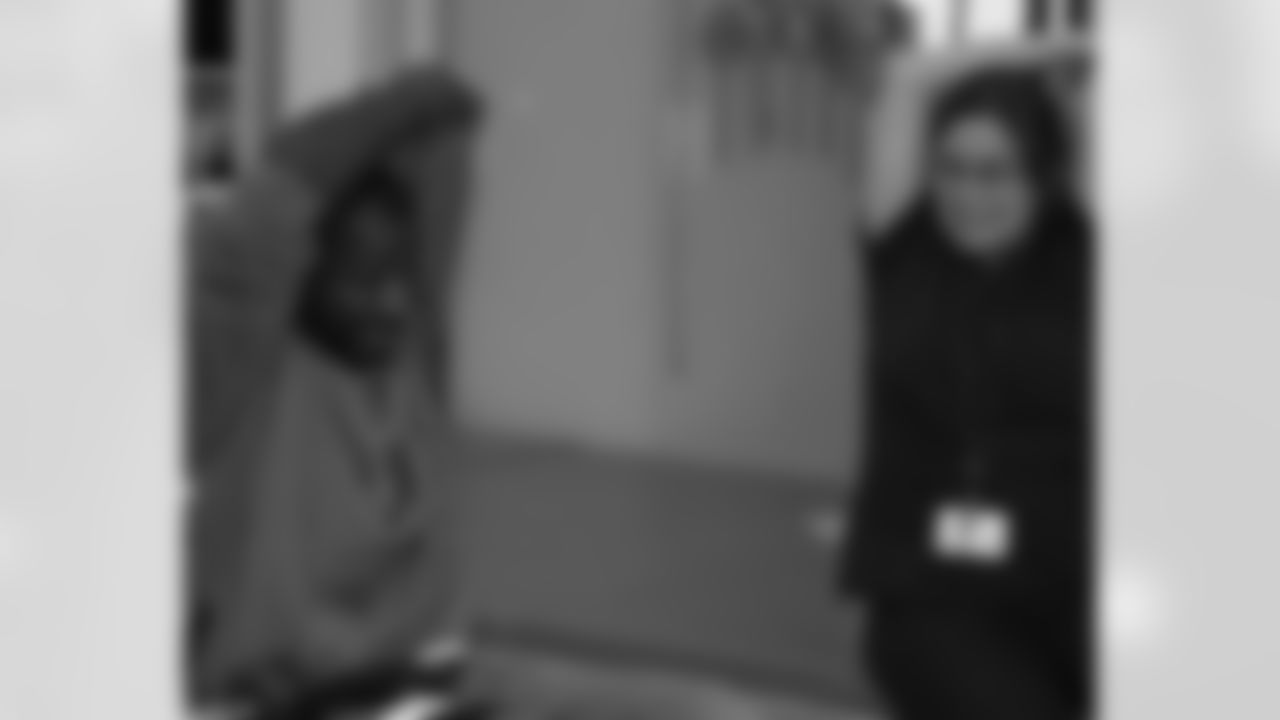 Avant jumps in to partcipate in group stretching with patients and therapists from Magee