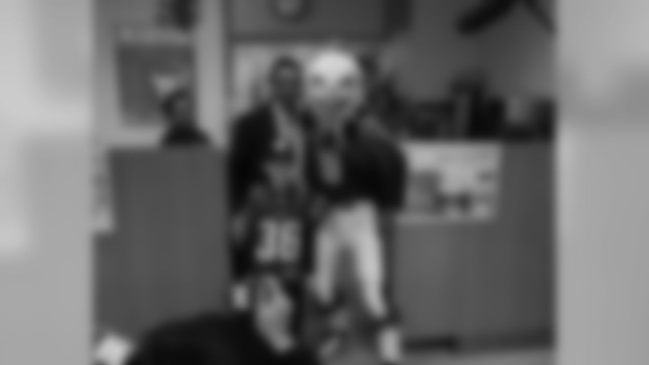 SWOOP poses with fans