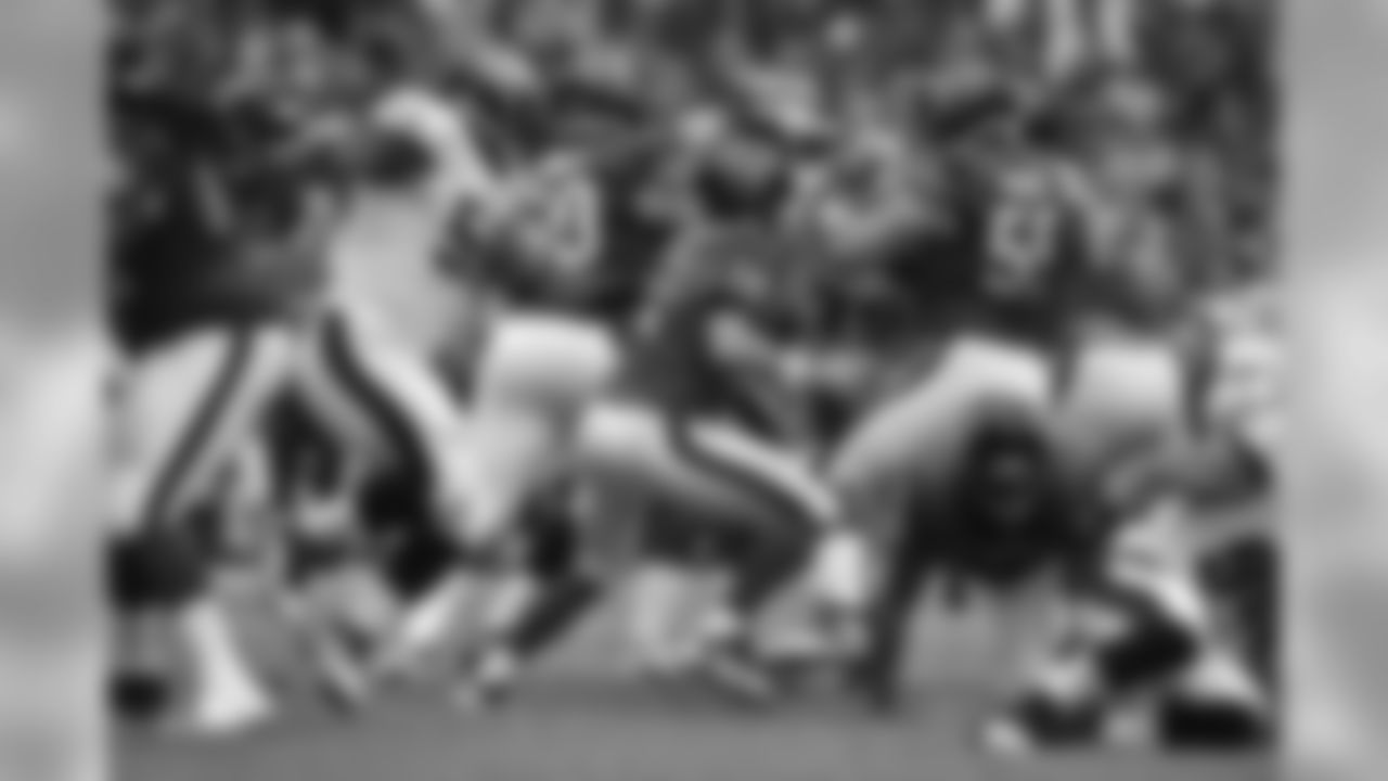 The Eagles defense swarming Fitzpatrick
