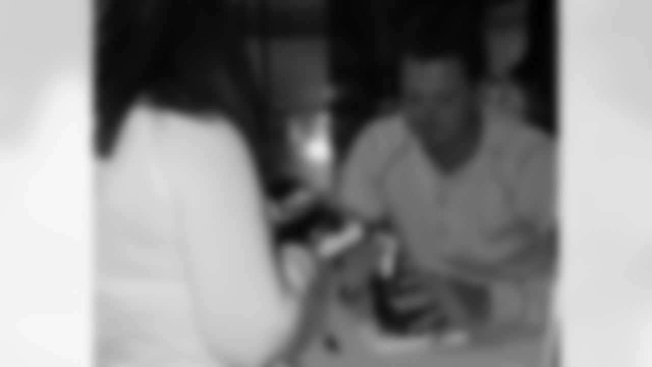 Fans could receive autographs by donating $10 to Tackling Breast Cancer or purchasing the Eagles pink merchandise