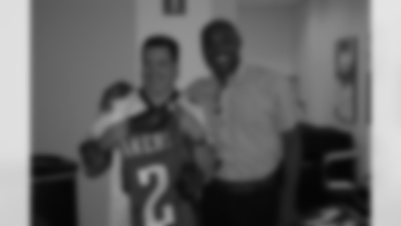 Fred Barnett with elated autographed Akers jersey winner