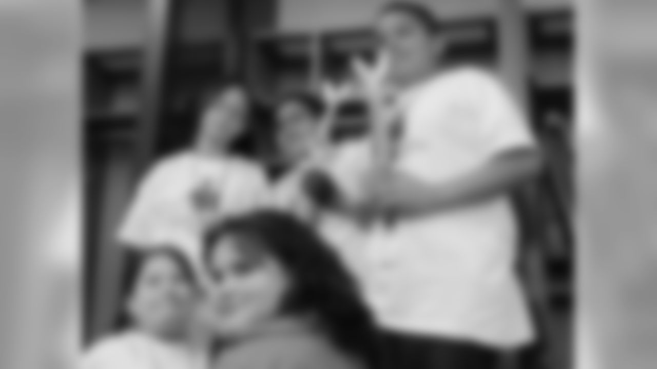 Following the tournament, winners received their trophies and medals in the Eagles' locker room at Lincoln Financial Field