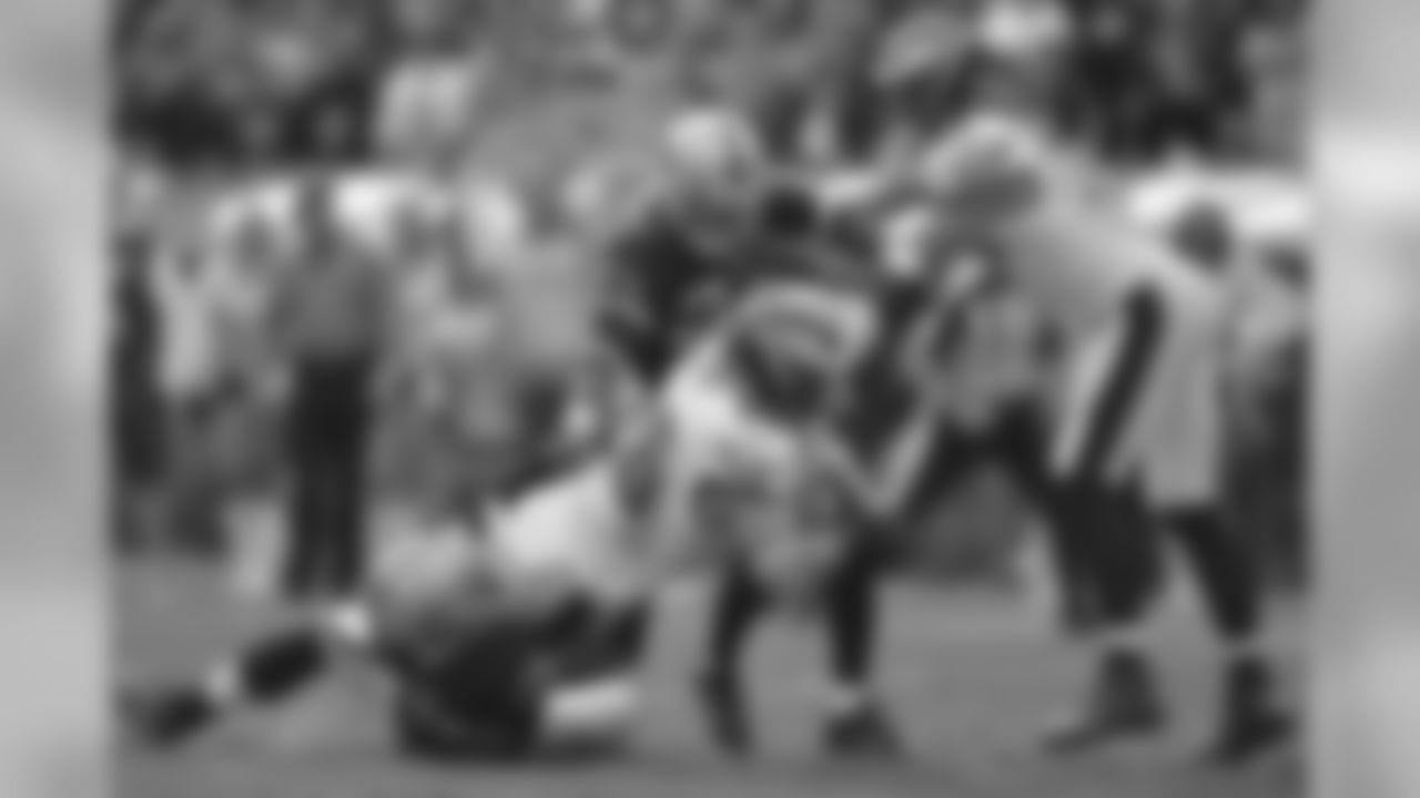 Eagles' TE Zach Ertz gets tackled after making a catch against the Raiders.
