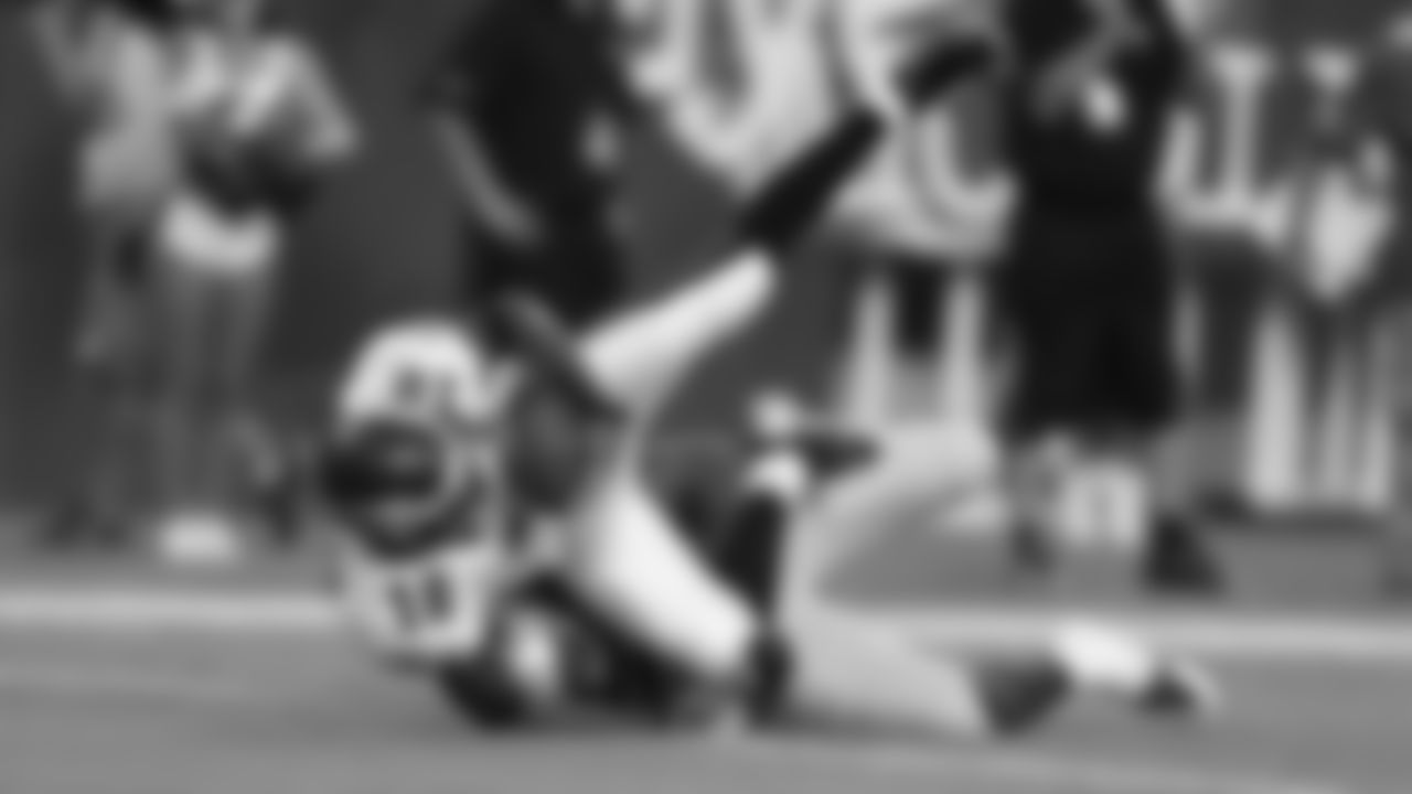 New York Jets' running back Mossis Madu gets stopped in his tracks by Eagles' linebacker Jake Knott (54) and Eagles' cornerback Jordan Poyer (33).