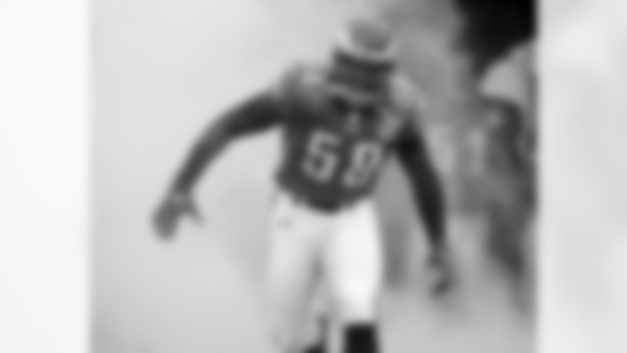 DE Trent Cole makes his entrance ...