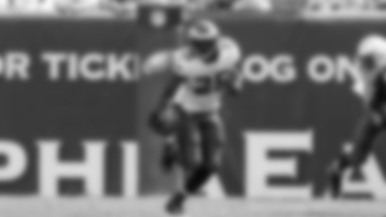 Eagles' running back LeSean McCoy runs in the open field against the Chargers' defense.
