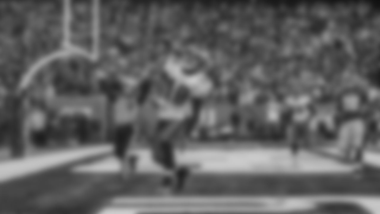 WR DeSean Jackson tosses the ball into the stands after scoring the game-winning touchdown