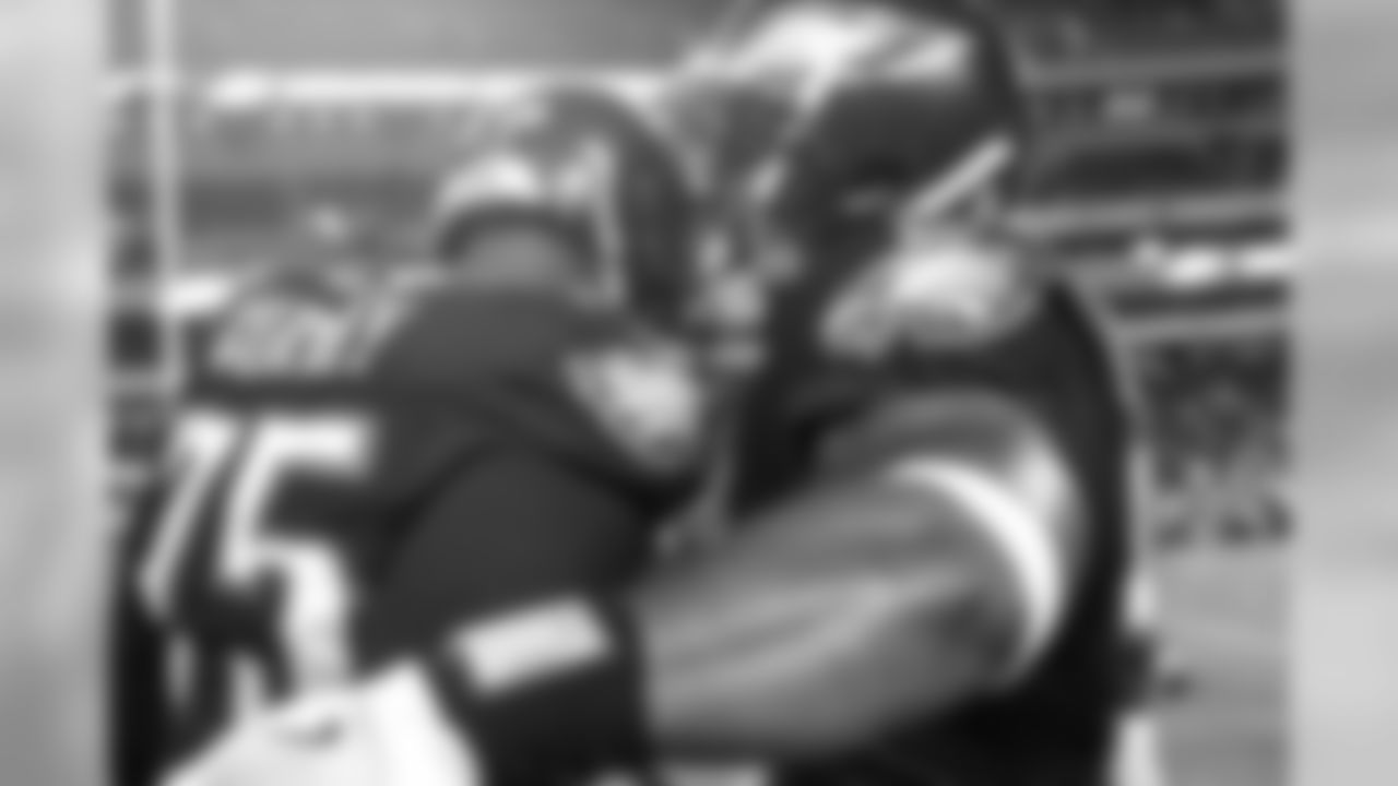 DE Vinny Curry and DE Brandon Graham on the sideline prior to kickoff.