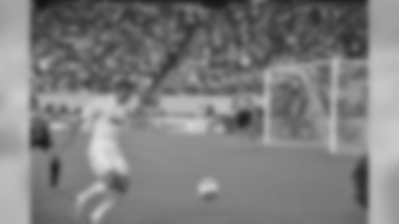 Karim Benzema looks to cross the ball into the box.