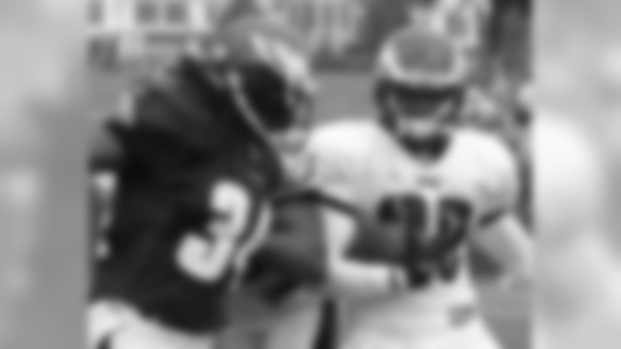 S Nate Allen returns a kickoff with RB Eldra Buckley in his sights