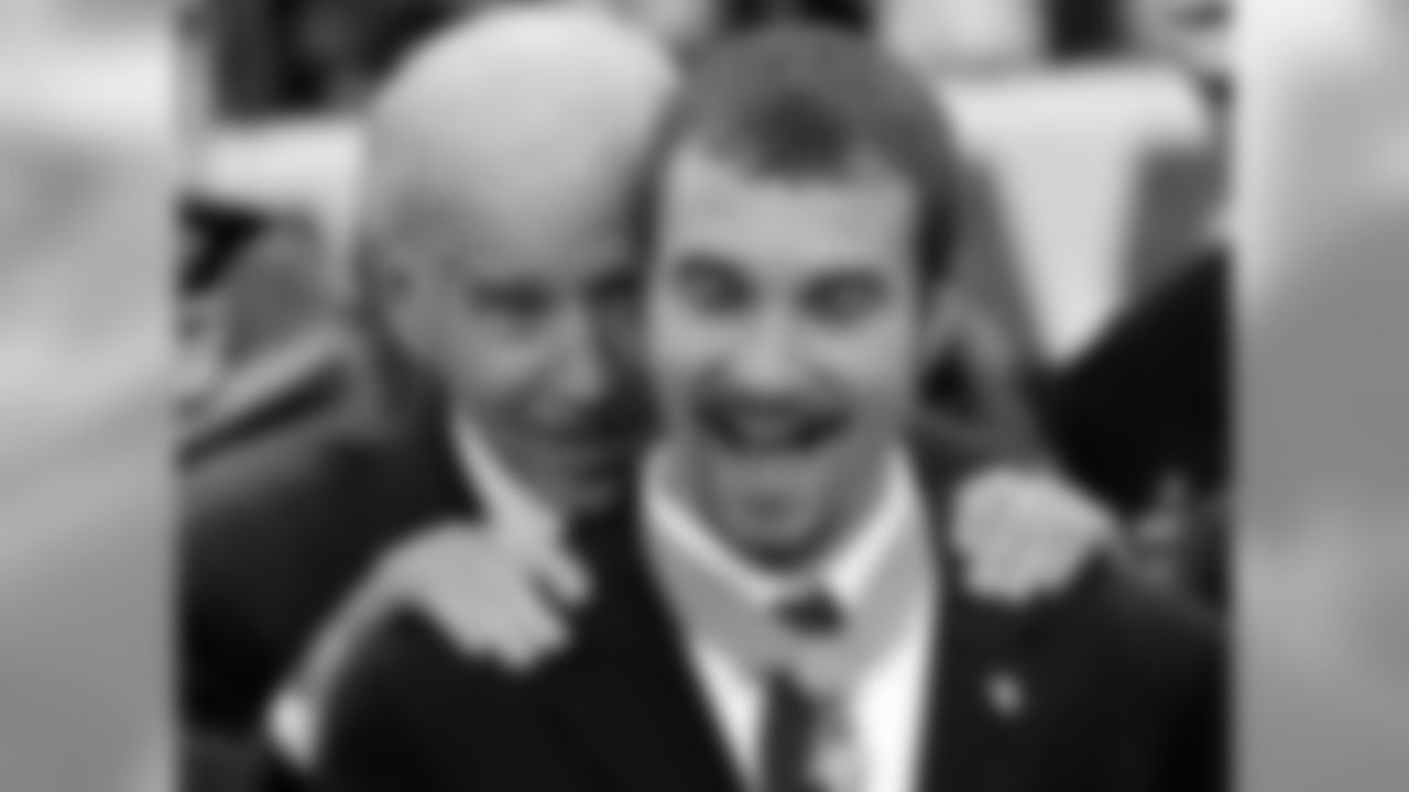 Vice President Joe Biden presents a Medal of Honor to Salvatore Giunta before the game