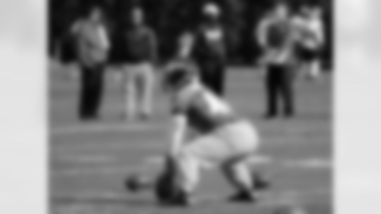 Jon Dorenbos works on his long snapping