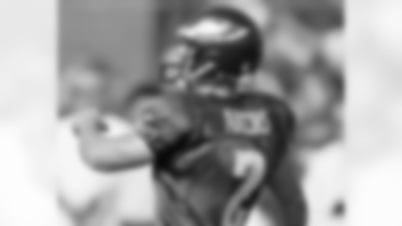 K David Akers looks to make sure his kick is good