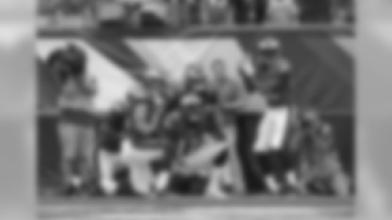 QB Carson Wentz, WR Alshon Jeffery, RB LeGarrette Blount and TE Zach Ertz all watch on as Smith prepares his touchdown-home run celebration.