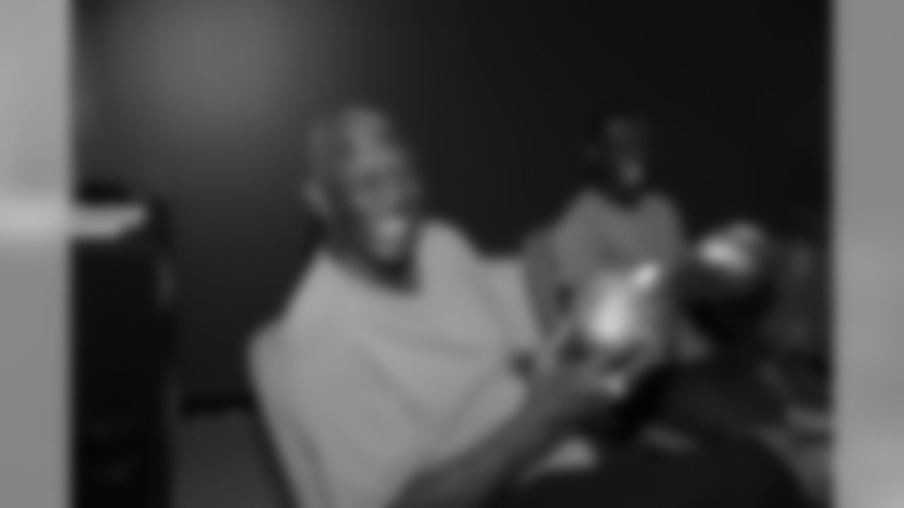 Harold Carmichael and Lito Sheppard share some laughs before the presentation