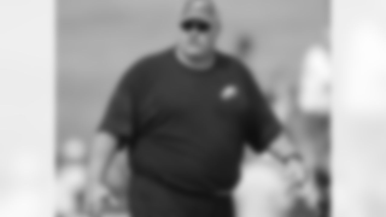 Head coach Andy Reid looks on