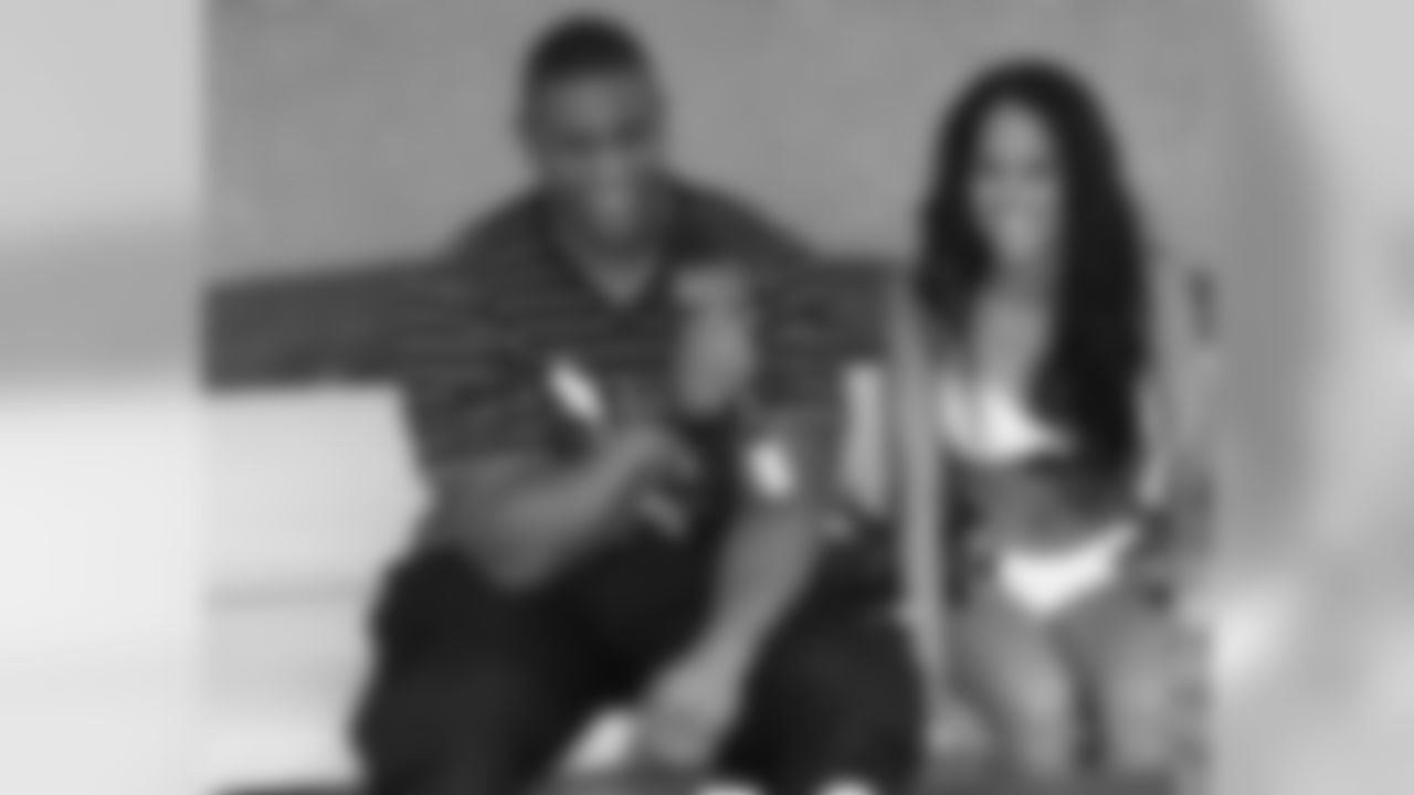 LaMarr Woodley asking Ivelisse some tough questions after the photo shoot for Maxim