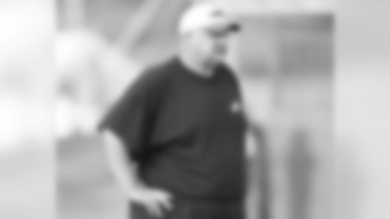 Head coach Andy Reid watches practice