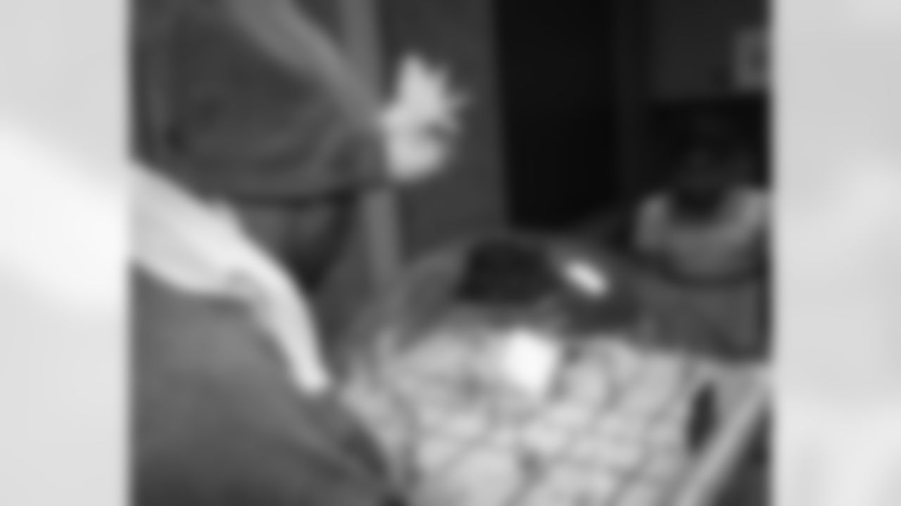 LS Jon Dorenbos engages in a game of bubble hockey