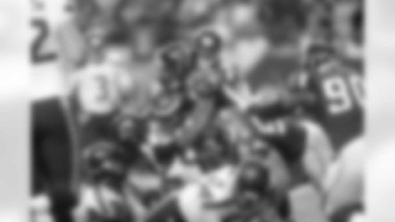 S William Moore and the Falcons defense stop Seahawks RB Marshawn Lynch
