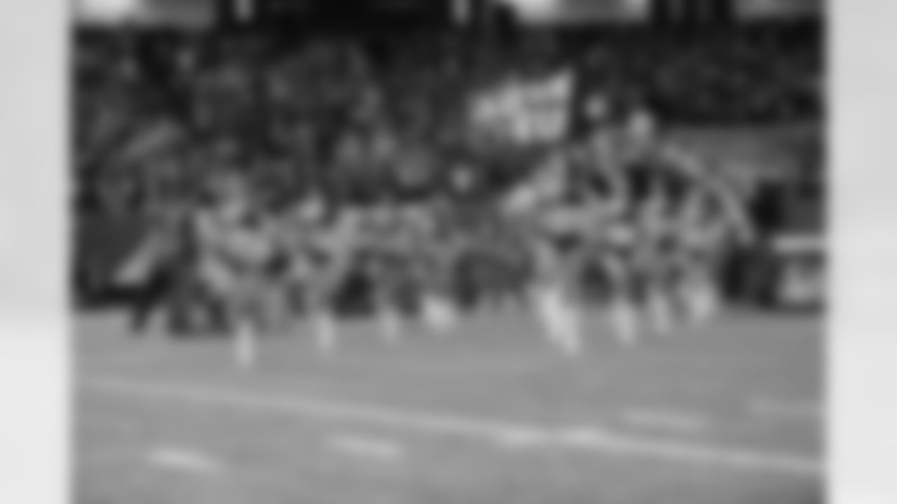 The Atlanta Falcons Cheerleaders run out of the tunnel in front of the players (PHOTOS: Art Morrison, Special to AtlantaFalcons.com)