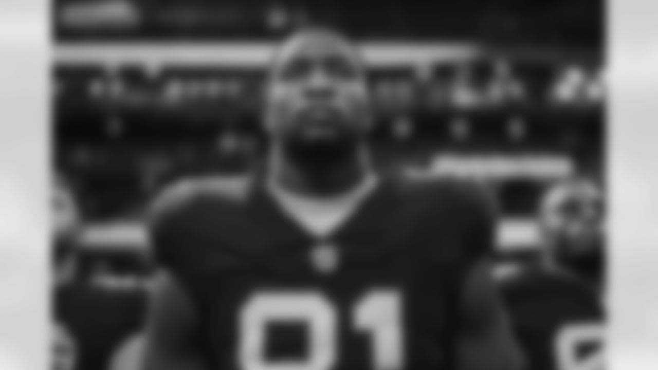 Atlanta Falcons tight end Jonnu Smith #81 during the National Anthem before the Week 2 Game against the Green Bay Packers at Mercedes-Benz Stadium in Atlanta, Georgia on Sunday, September 17, 2023. (Photo by Shanna Lockwood/Atlanta Falcons)