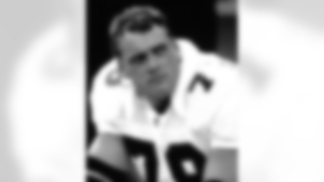 Falcons Ring of Honor offensive lineman Mike Kenn looks on during a game