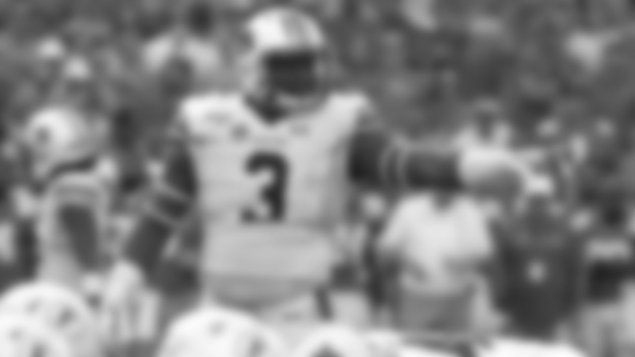 FILE - In this Oct. 5, 2019, file photo, Auburn defensive end Marlon Davidson (3) signals to teammates before a play during the first half of an NCAA college football game against Florida, in Gainesville, Fla. Davidson was selected to The Associated Press All-Southeastern Conference football team, Monday, Dec. 9, 2019.(AP Photo/John Raoux, File)