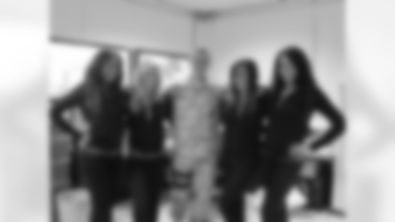 From left to right, Shamea M., Sabrina C., Sara D. and Alicia D. pose with a member of the military in Curacao // 6/9-12/11 // Curacao -