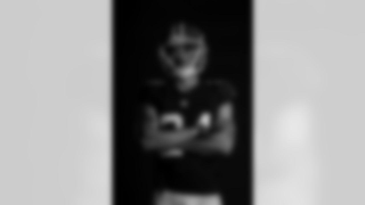 AJ Terrell poses for a portrait during the Red Helmet shoot at Mercedes-Benz Stadium in Atlanta, Georgia on Friday, May 17, 2022. (Photo by Brandon Magnus/Atlanta Falcons)