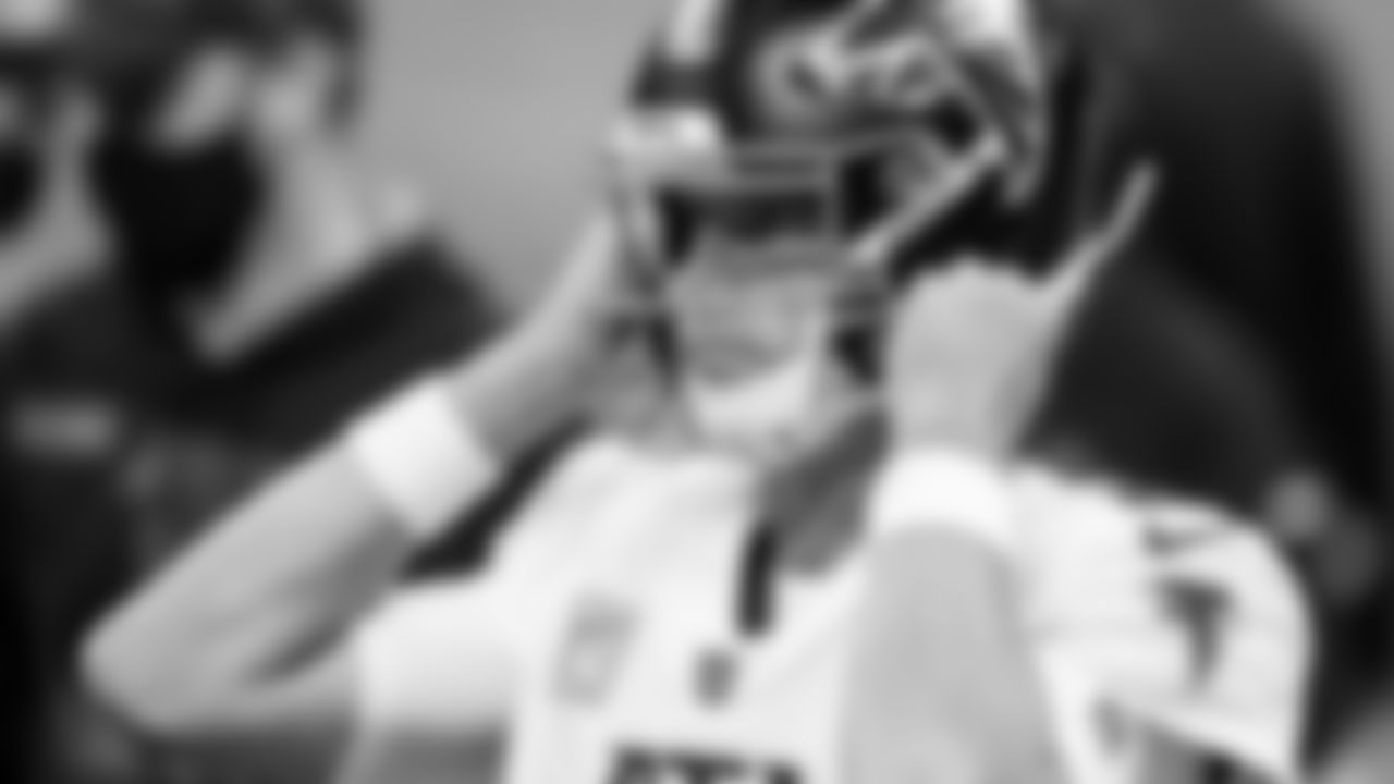 Atlanta Falcons quarterback Matt Ryan #2 puts on his helmet for the second half against the New Orleans Saints on November 22, 2020.